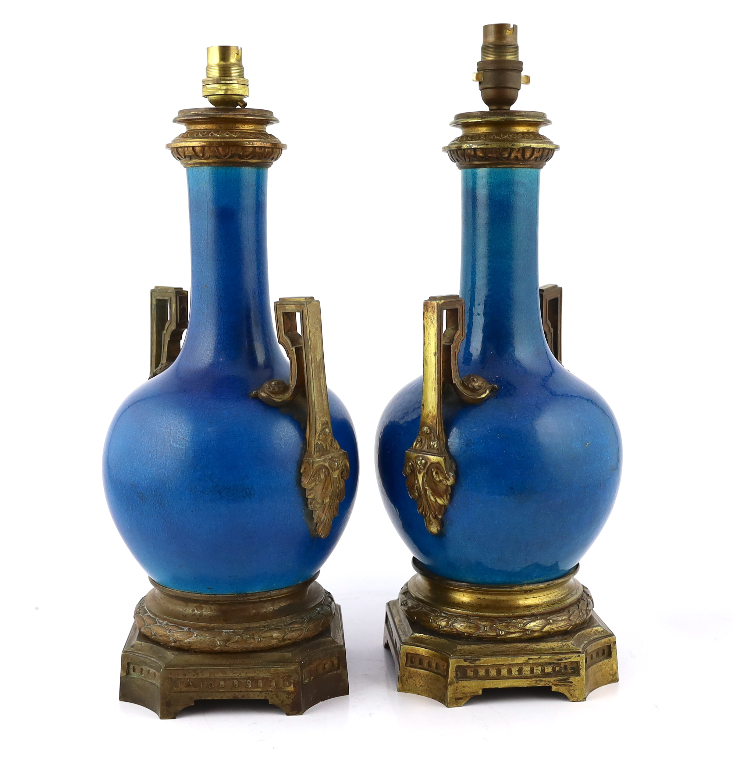 A pair of Chinese or Japanese turquoise-glazed bottle vases with Louis XVI style ormolu lamp mounts, late 19th century